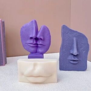 2 Abstract Face Sculptures candle molds - Purple and Cream